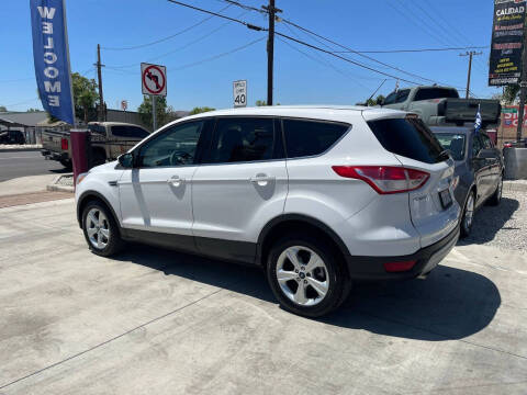 2015 Ford Escape for sale at E and M Auto Sales in Bloomington CA