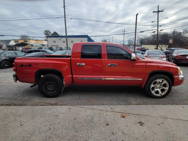 2005 Dodge Dakota for sale at DAGO'S AUTO SALES LLC in Dalton, GA