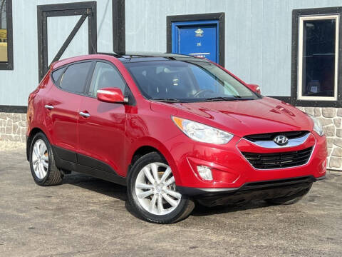 2013 Hyundai Tucson for sale at Dynamics Auto Sale in Highland IN