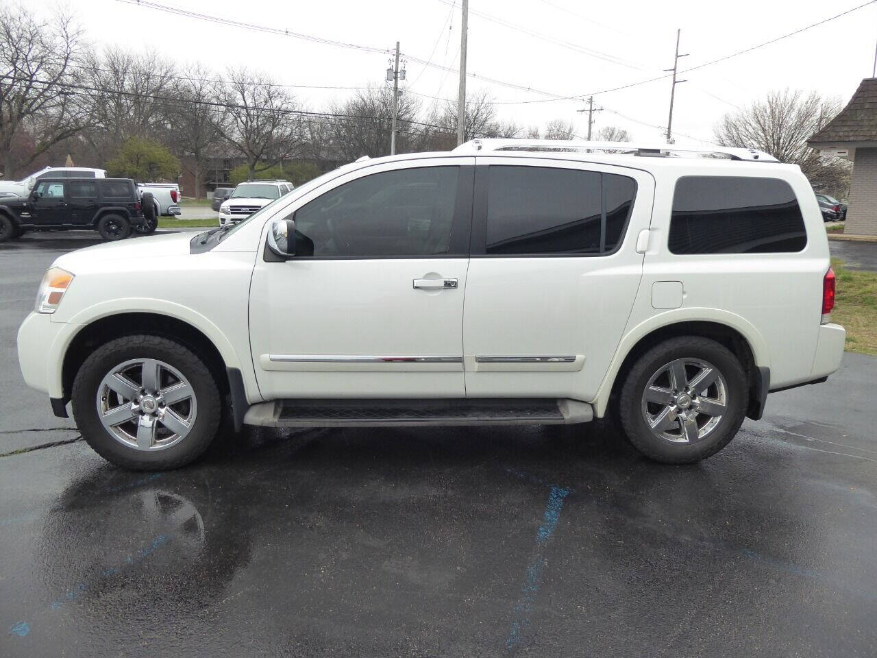 2013 Nissan Armada for sale at Lakeshore Autos in Holland, MI