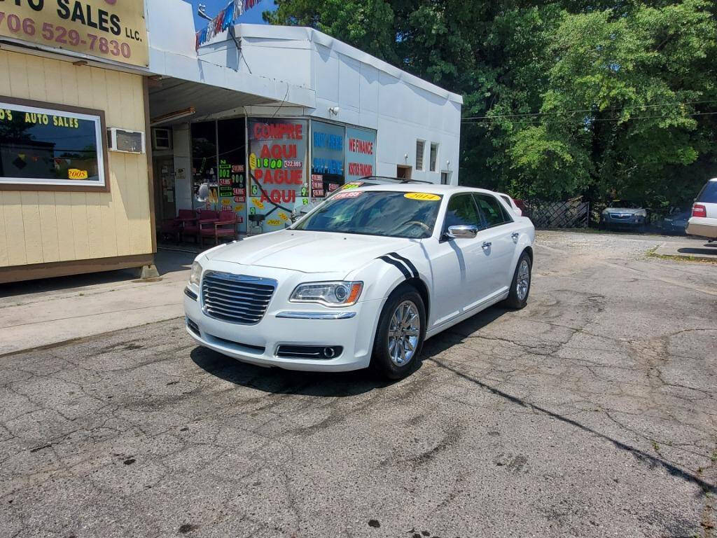 2014 Chrysler 300 for sale at DAGO'S AUTO SALES LLC in Dalton, GA