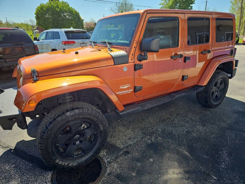 2011 Jeep Wrangler Unlimited for sale at Faithful Cars Auto Sales in North Branch MI