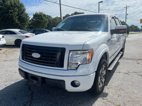 2011 Ford F-150 for sale at Luxury Cars of Atlanta in Snellville GA