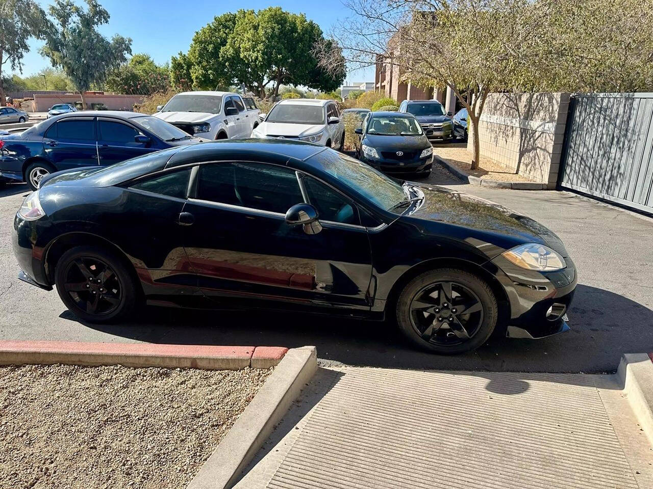 2006 Mitsubishi Eclipse for sale at HUDSONS AUTOS in Gilbert, AZ