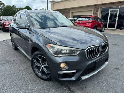 2017 BMW X1 for sale at North Georgia Auto Brokers in Snellville GA