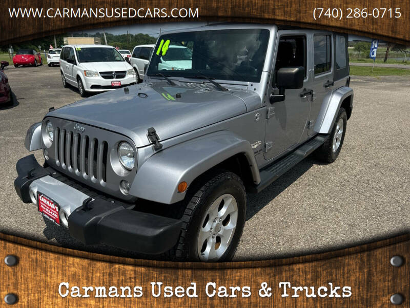 2014 Jeep Wrangler Unlimited for sale at Carmans Used Cars & Trucks in Jackson OH