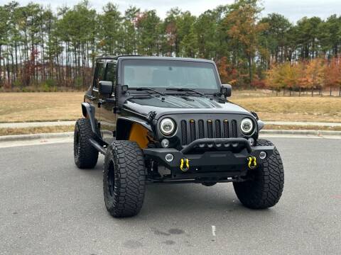 2014 Jeep Wrangler Unlimited for sale at Carrera Autohaus Inc in Durham NC