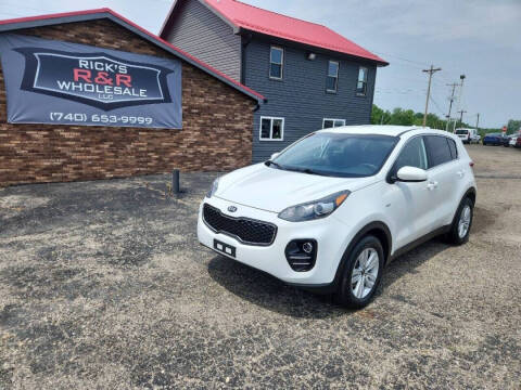 2017 Kia Sportage for sale at Rick's R & R Wholesale, LLC in Lancaster OH