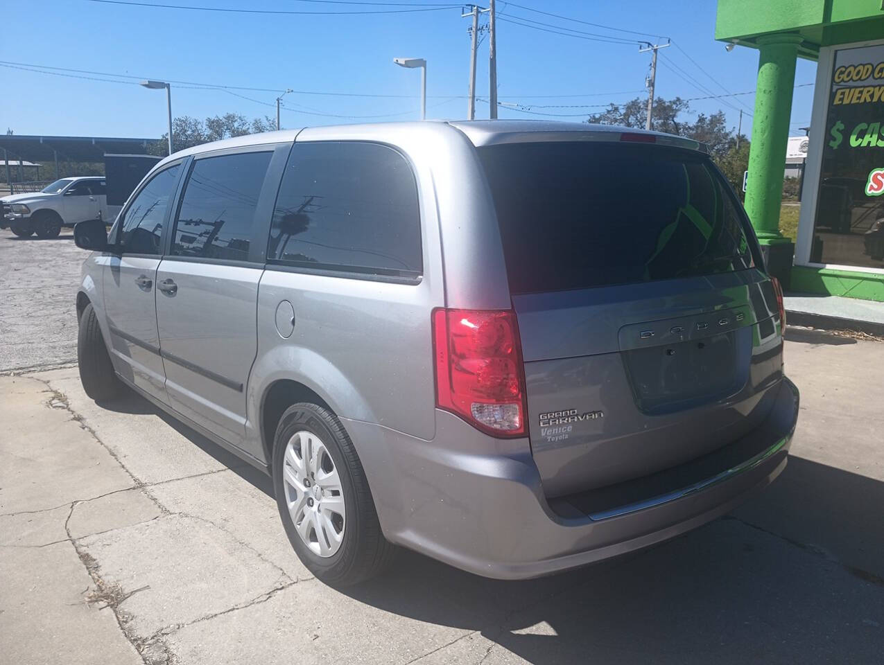 2014 Dodge Grand Caravan for sale at Auto Outlet Of Manatee in Palmetto, FL