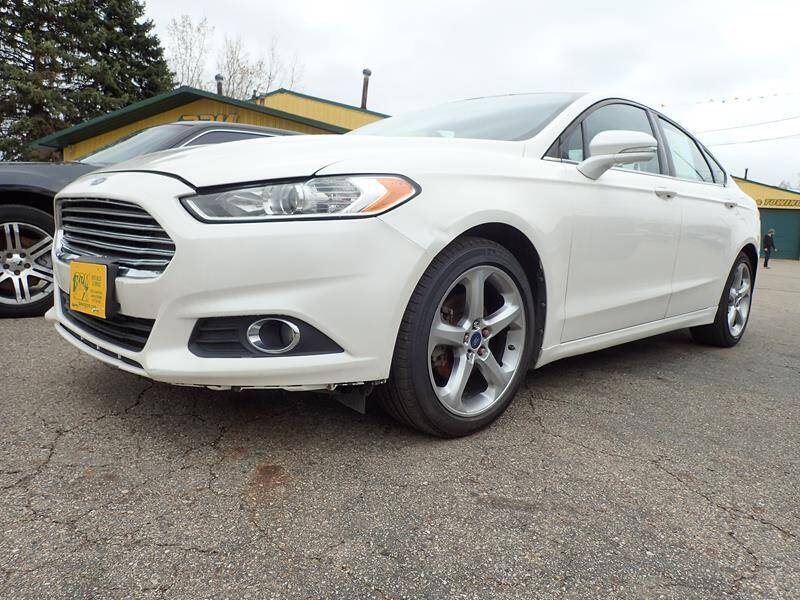2013 Ford Fusion for sale at RPM AUTO SALES in Lansing MI