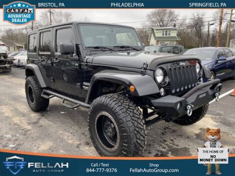 2015 Jeep Wrangler Unlimited for sale at Fellah Auto Group in Philadelphia PA