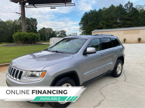 2014 Jeep Grand Cherokee for sale at Two Brothers Auto Sales in Loganville GA