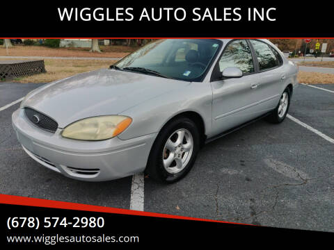 2004 Ford Taurus for sale at WIGGLES AUTO SALES INC in Mableton GA