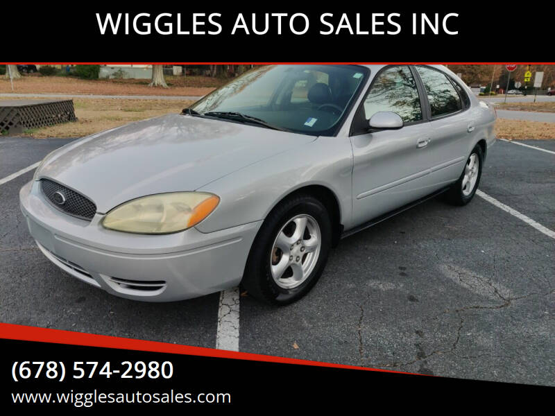 2004 Ford Taurus for sale at WIGGLES AUTO SALES INC in Mableton GA