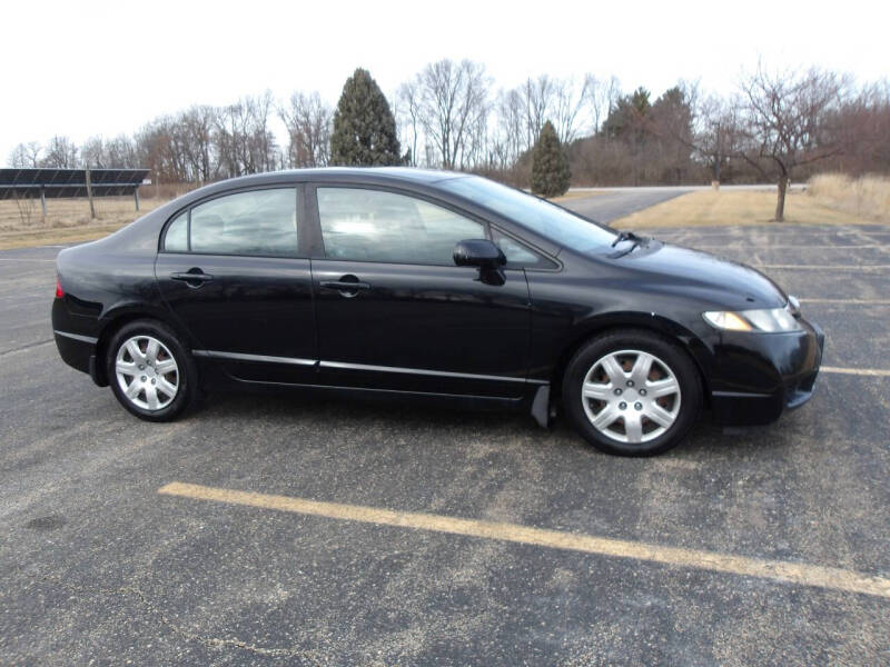 2010 Honda Civic for sale at Crossroads Used Cars Inc. in Tremont IL