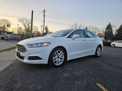 2015 Ford Fusion for sale at DALE'S AUTO INC in Mount Clemens MI