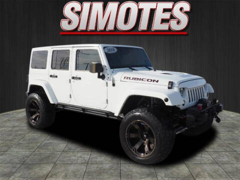 2016 Jeep Wrangler Unlimited for sale at SIMOTES MOTORS in Minooka IL