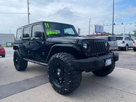 2011 Jeep Wrangler Unlimited for sale at Apollo Auto Sales LLC in Sioux City IA