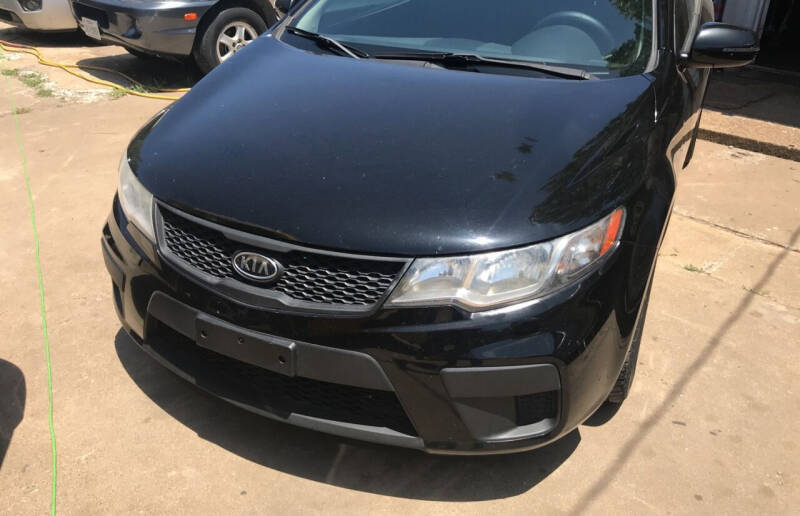 2011 Kia Forte Koup for sale at Simmons Auto Sales in Denison TX