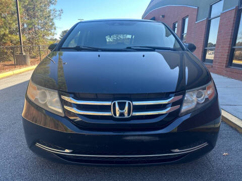 2014 Honda Odyssey for sale at Phoenix Motor Sales in Snellville GA