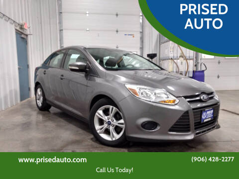 2014 Ford Focus for sale at PRISED AUTO in Gladstone MI