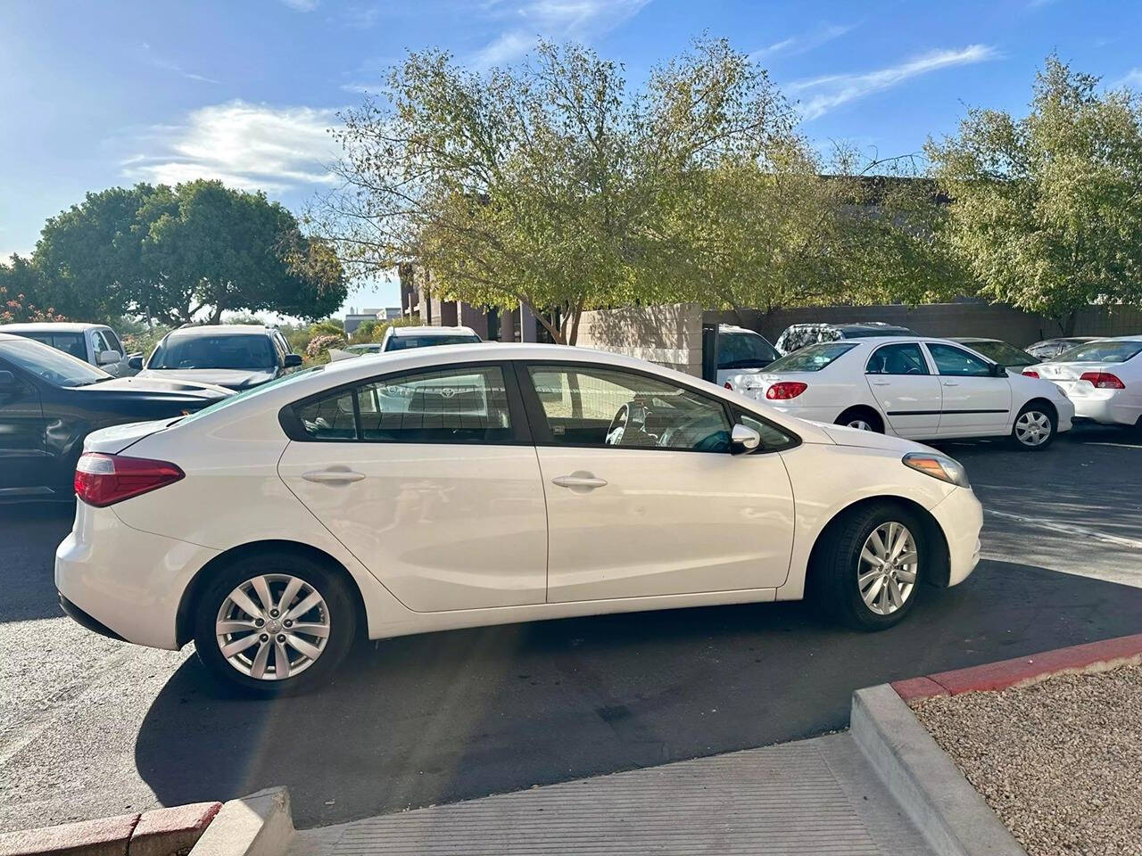 2016 Kia Forte for sale at HUDSONS AUTOS in Gilbert, AZ