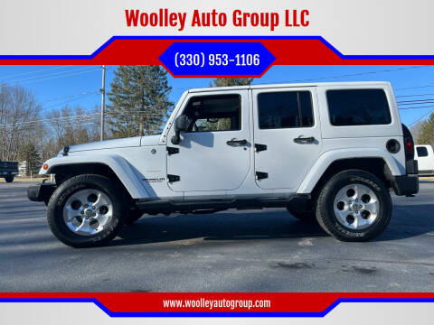2013 Jeep Wrangler Unlimited for sale at Woolley Auto Group LLC in Poland OH