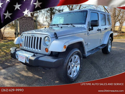 2011 Jeep Wrangler Unlimited for sale at Lifetime Auto Sales and Service in West Bend WI