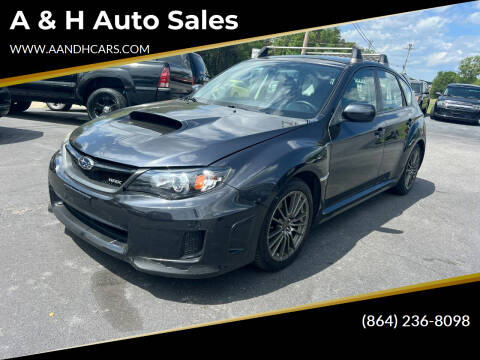 2011 Subaru Impreza for sale at A & H Auto Sales in Greenville SC
