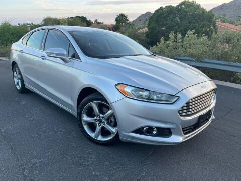 2014 Ford Fusion for sale at Savings Auto Sales in Phoenix AZ