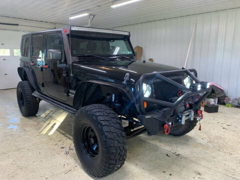 2012 Jeep Wrangler Unlimited for sale at SMS Motorsports LLC in Cortland NY