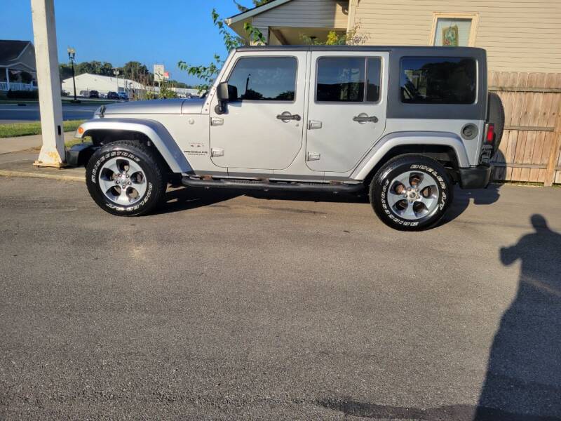 2016 Jeep Wrangler Unlimited for sale at MADDEN MOTORS INC in Peru IN