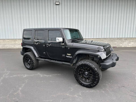 2012 Jeep Wrangler Unlimited for sale at HENLEY MOTORS in Shady Cove OR