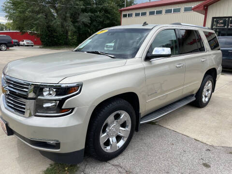2015 Chevrolet Tahoe for sale at Azteca Auto Sales LLC in Des Moines IA