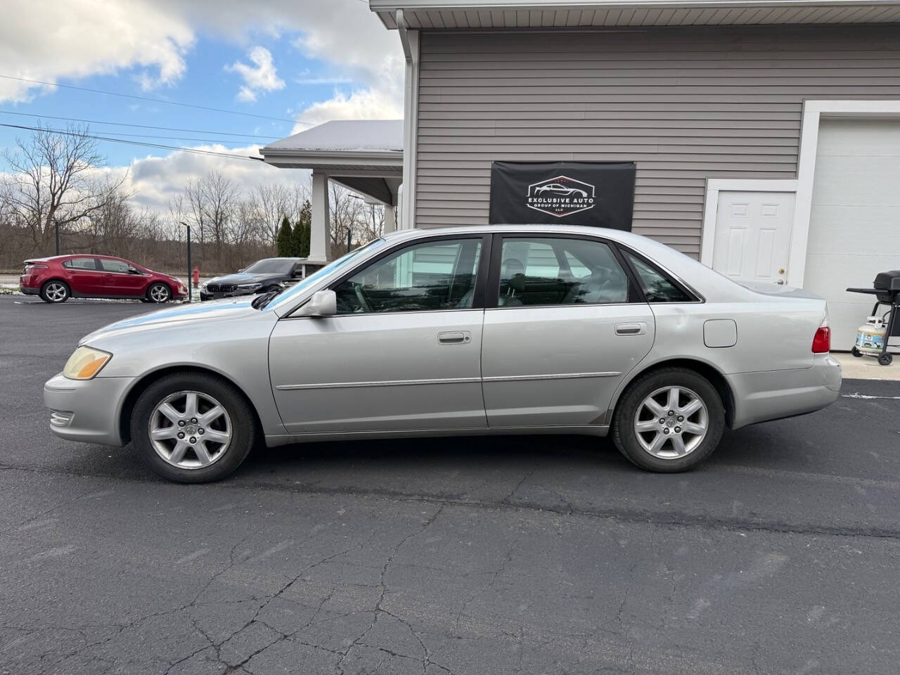 2003 Toyota Avalon for sale at Exclusive Auto Group of Michigan LLC in Lansing, MI