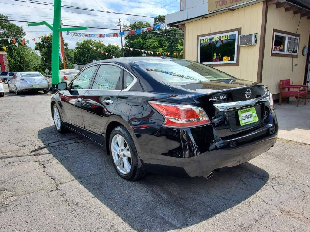 2015 Nissan Altima for sale at DAGO'S AUTO SALES LLC in Dalton, GA