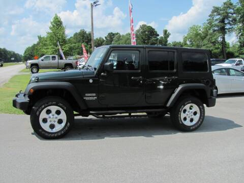 2011 Jeep Wrangler Unlimited for sale at Pure 1 Auto in New Bern NC