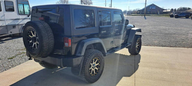 2014 Jeep Wrangler Unlimited for sale at CORNMAN AUTO LLC in Kirksville, MO