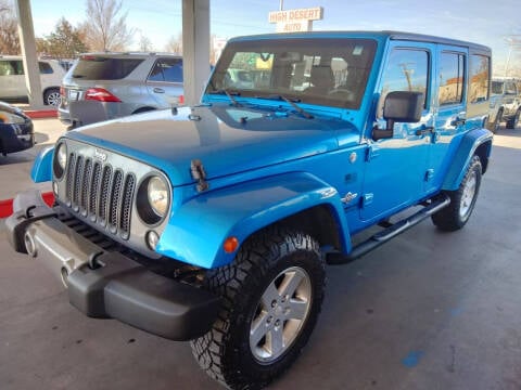 2014 Jeep Wrangler Unlimited for sale at High Desert Auto Wholesale in Albuquerque NM