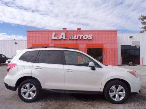 2015 Subaru Forester for sale at L A AUTOS in Omaha NE