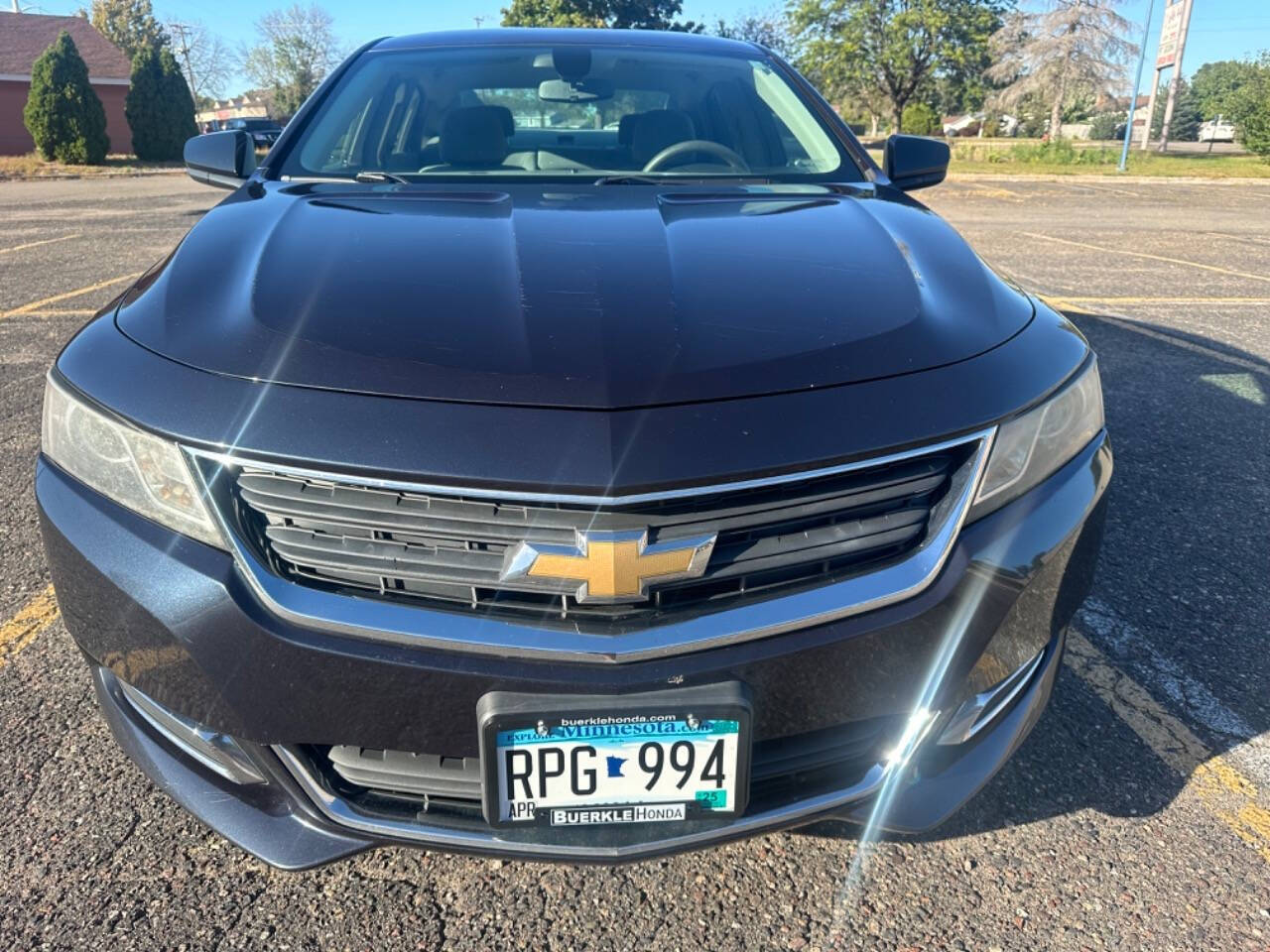 2014 Chevrolet Impala for sale at JUST AUTOS in MINNEAPOLIS, MN