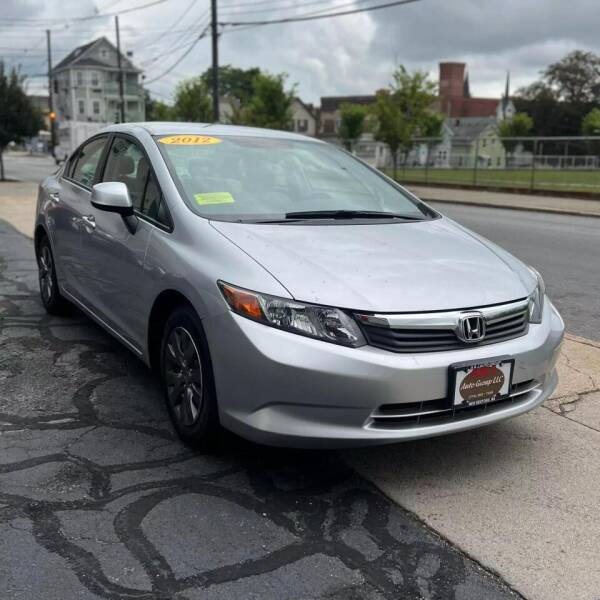 2012 Honda Civic for sale at A & J AUTO GROUP in New Bedford MA