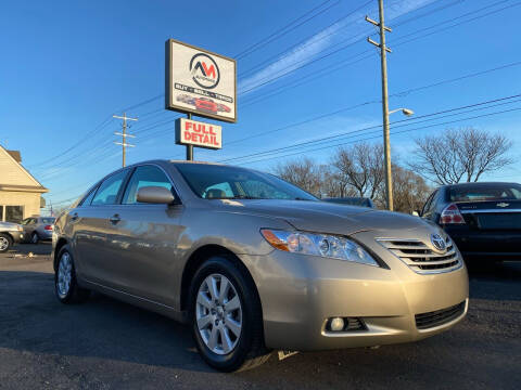 2009 Toyota Camry for sale at Automania in Dearborn Heights MI
