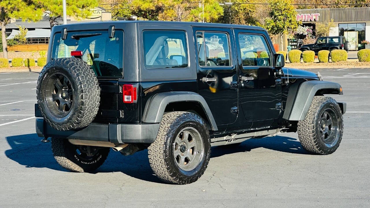 2015 Jeep Wrangler Unlimited for sale at H & B Auto in Fayetteville, AR