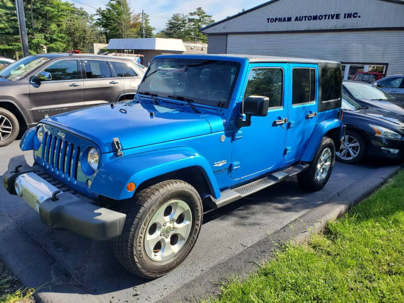 2015 Jeep Wrangler Unlimited for sale at Topham Automotive Inc. in Middleboro MA