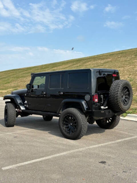 2015 Jeep Wrangler Unlimited for sale at GHOST AUTOWERKZ in Northbrook, IL