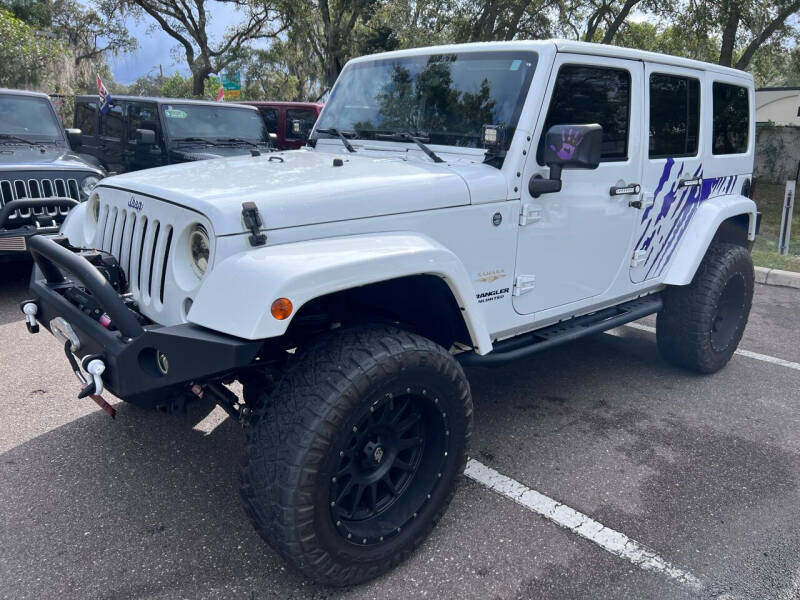 2014 Jeep Wrangler Unlimited for sale at Bay City Autosales in Tampa FL