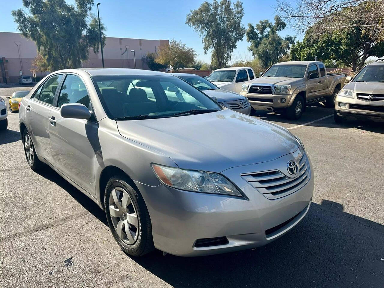 2007 Toyota Camry for sale at HUDSONS AUTOS in Gilbert, AZ