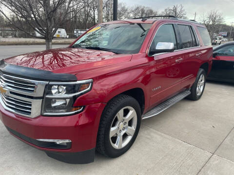 2015 Chevrolet Tahoe for sale at Azteca Auto Sales LLC in Des Moines IA