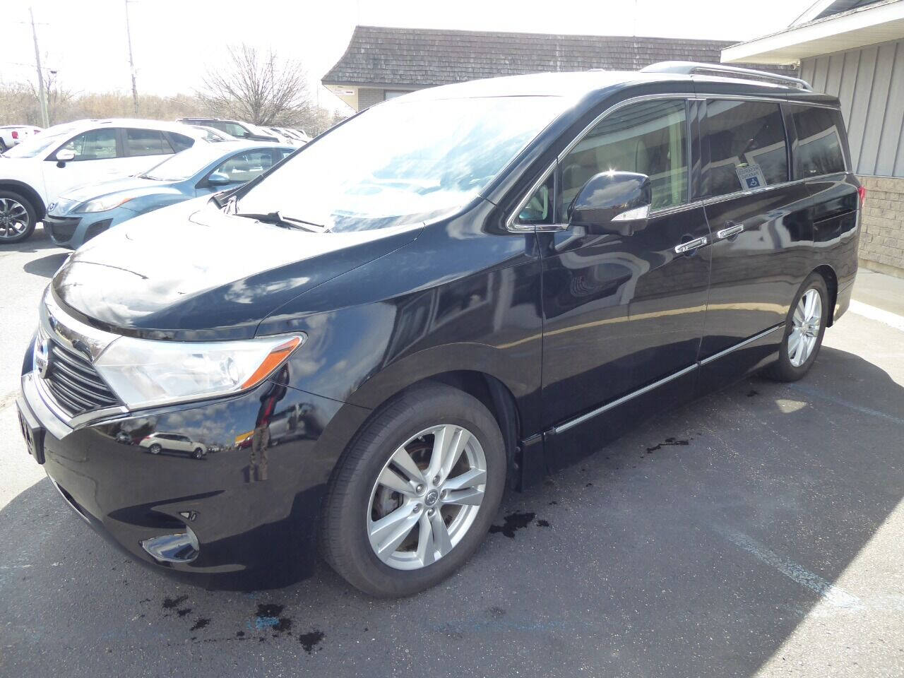 2014 Nissan Quest for sale at Lakeshore Autos in Holland, MI